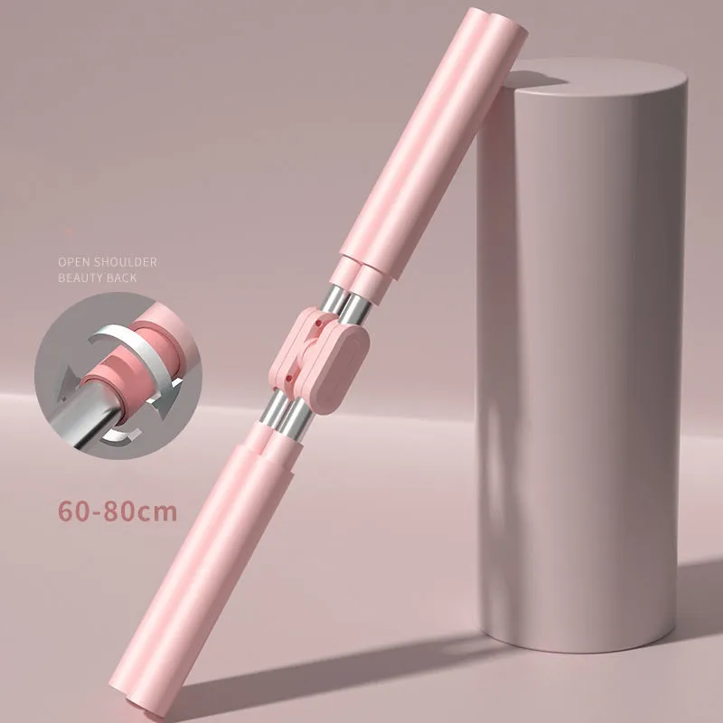 Adjustable yoga body stick in pink with foam grip on white background