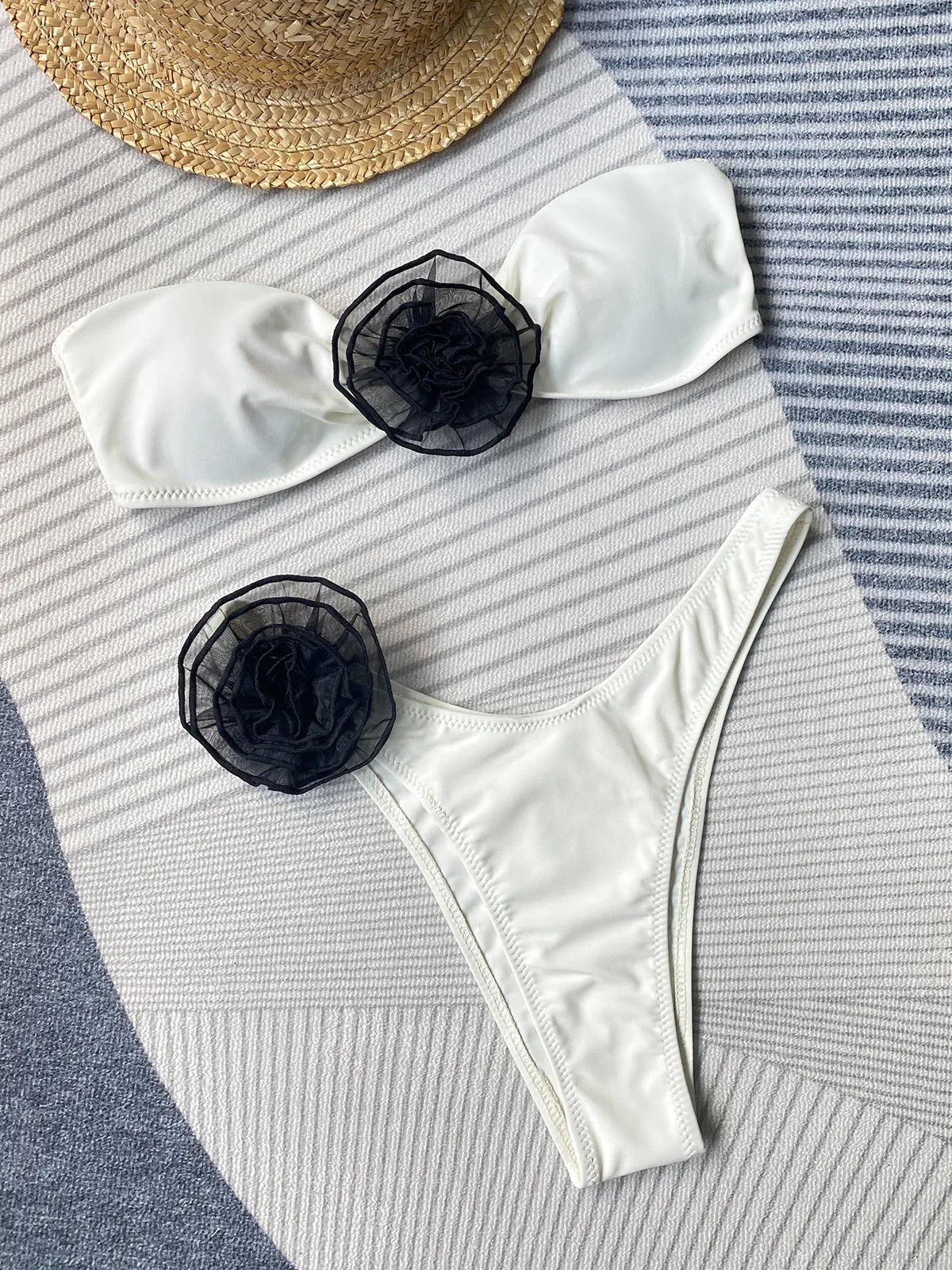Cross-strap tube top bikini with three-dimensional flower detail in striped pattern