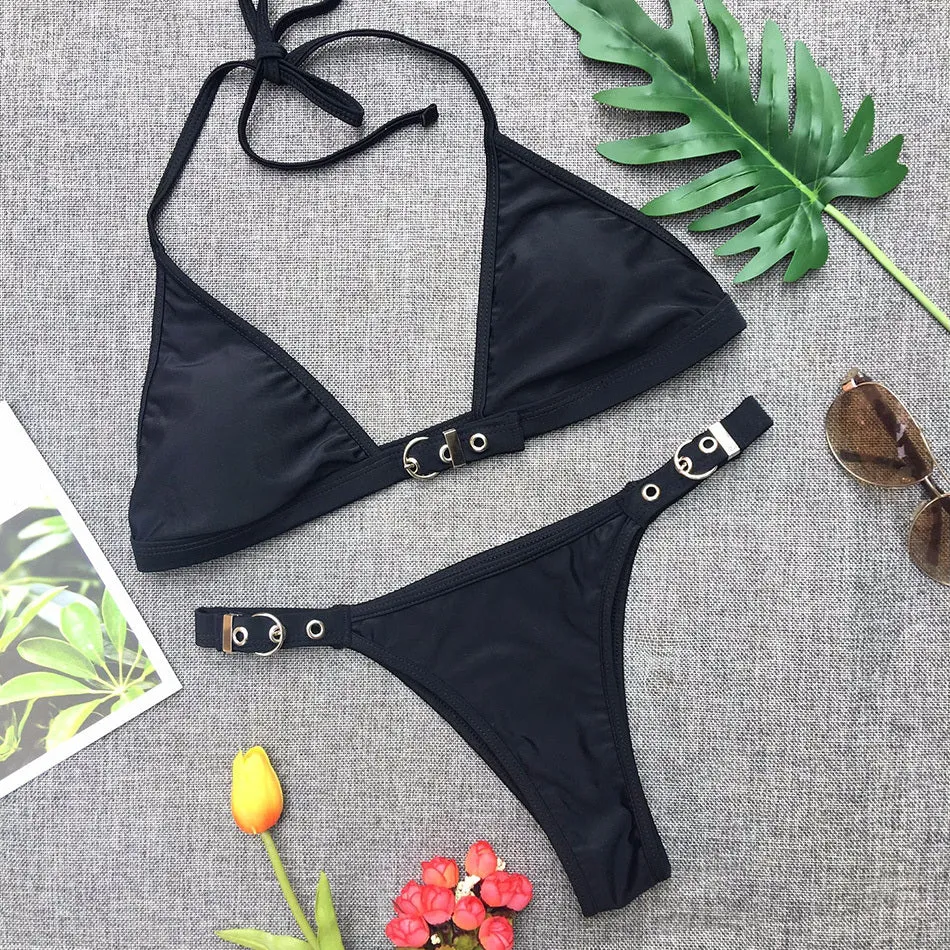 Women's solid colour thong bikini set in black nylon with adjustable straps and chest pad