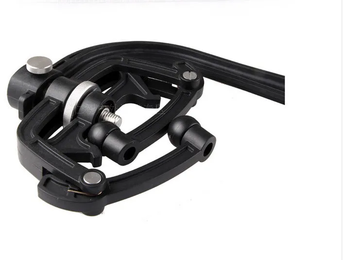 Black fishing line winder tool with adjustable tension mechanism for solo spooling