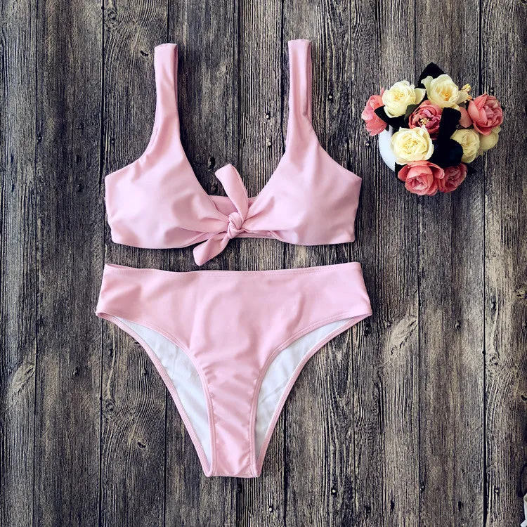 European style solid colour bikini set with bra and panties on white background