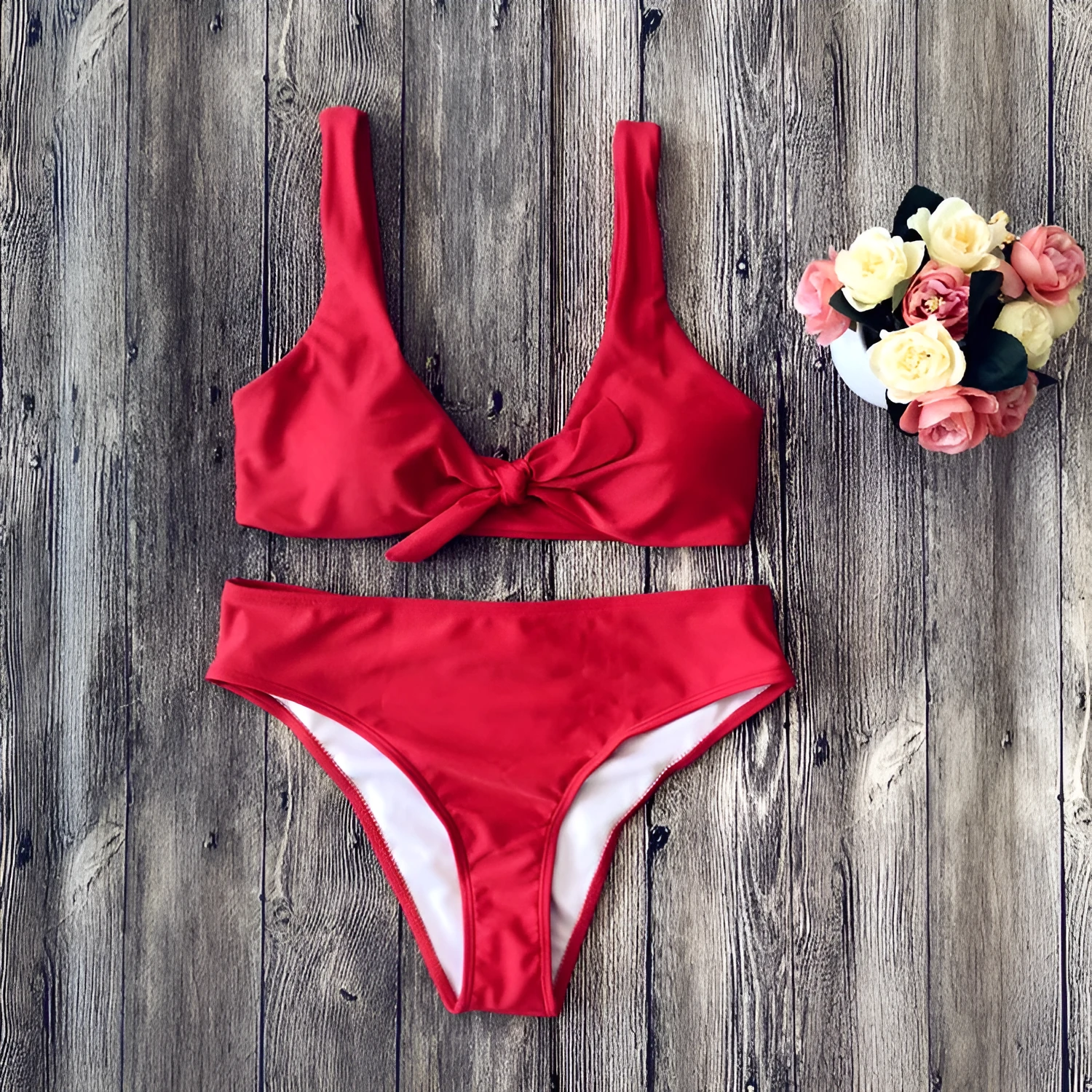 European style solid colour bikini set with bra and panties on white background