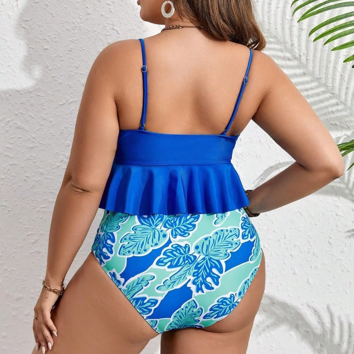 Blue plus size two-piece bikini swimsuit for women on a mannequin.