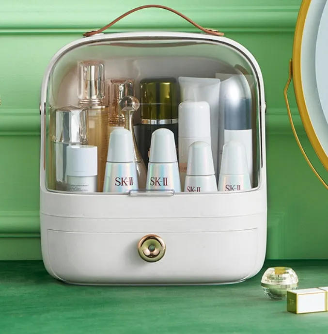 Desktop cosmetics storage box in green PET with dustproof lid and handle