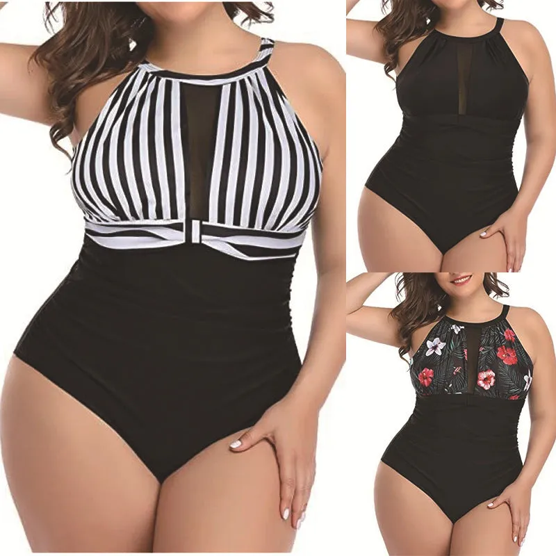 Women's black lace one-piece swimsuit on a hanger showing the front design