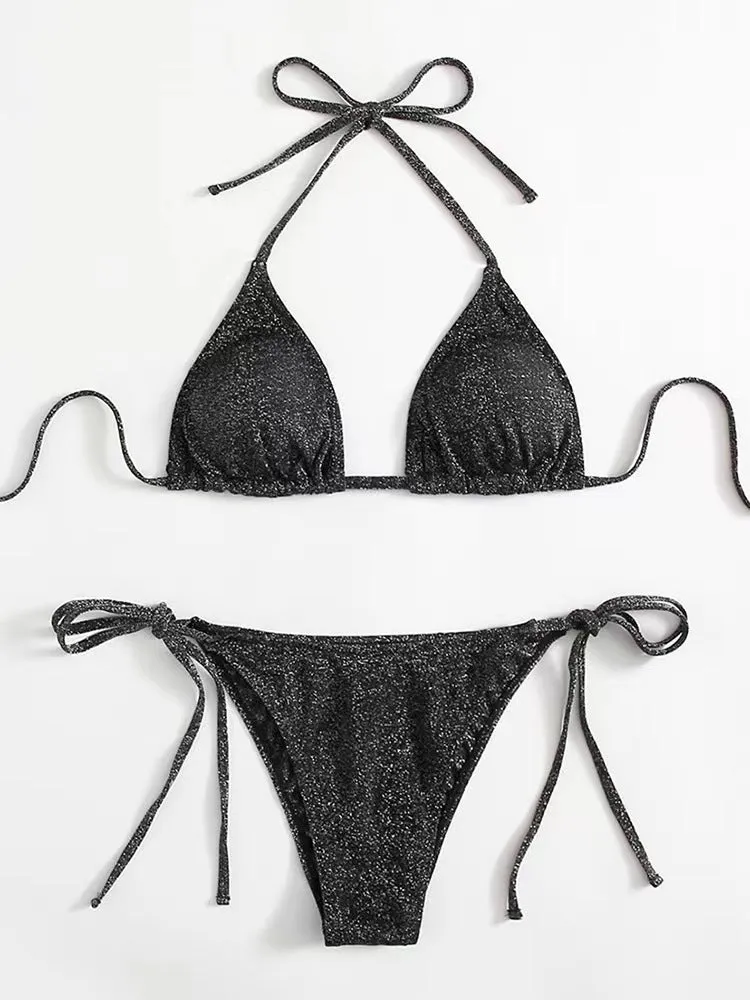Women's split bandage style bikini swimsuit in polyester fabric on a mannequin.