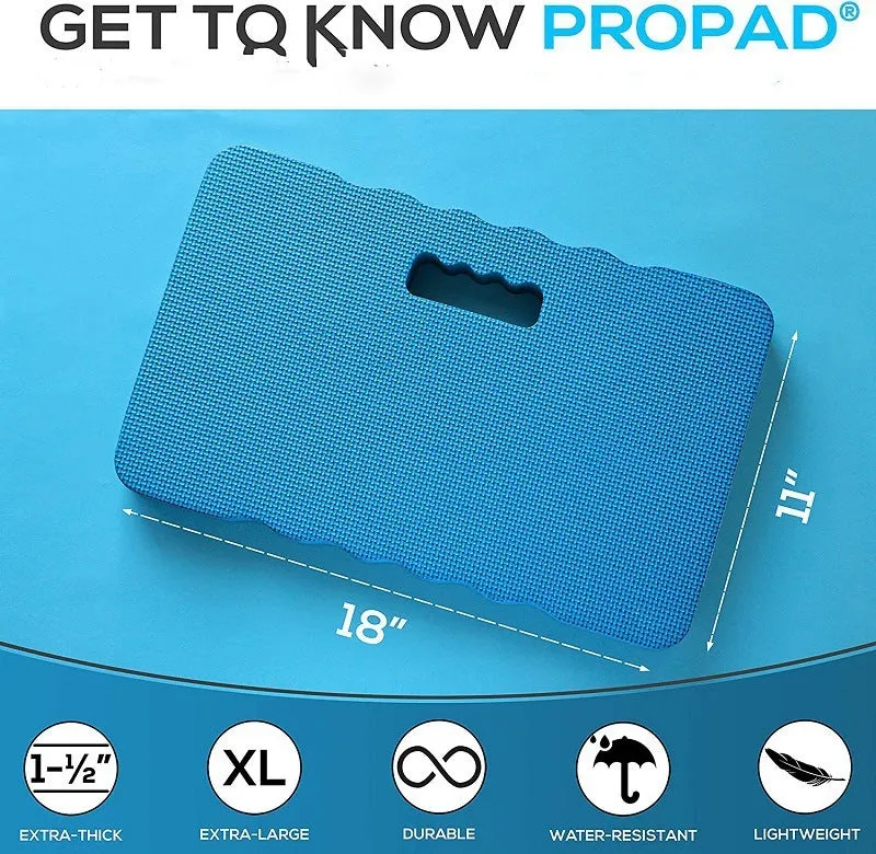 A blue plastic garden kneeler pad on grass, showing its size and cushioned surface for kneeling.