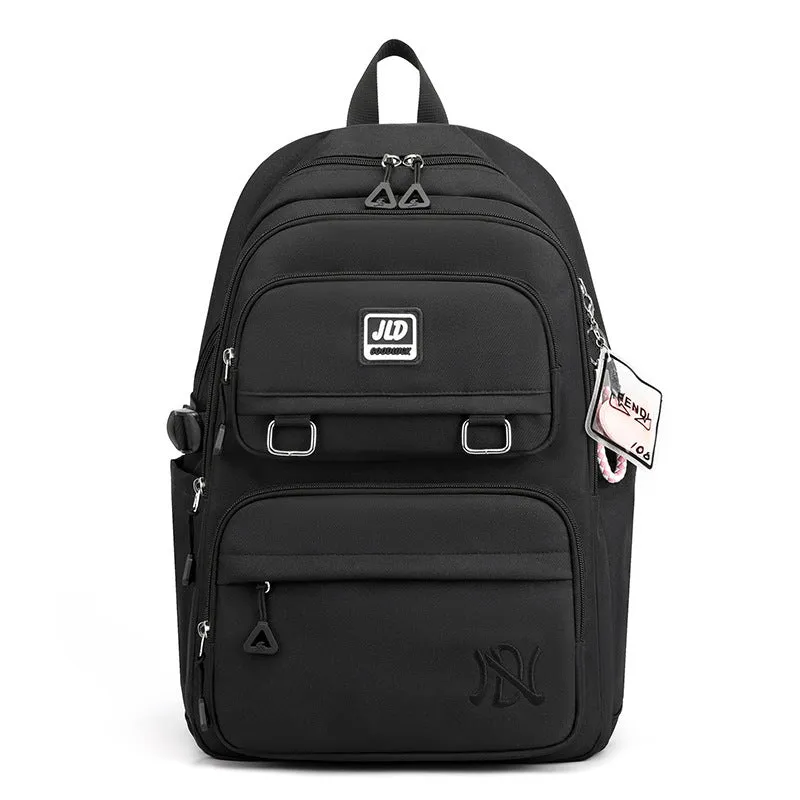 Girls' large capacity nylon school backpack in a selection of colours and graphic patterns on a physiological curve backplane.