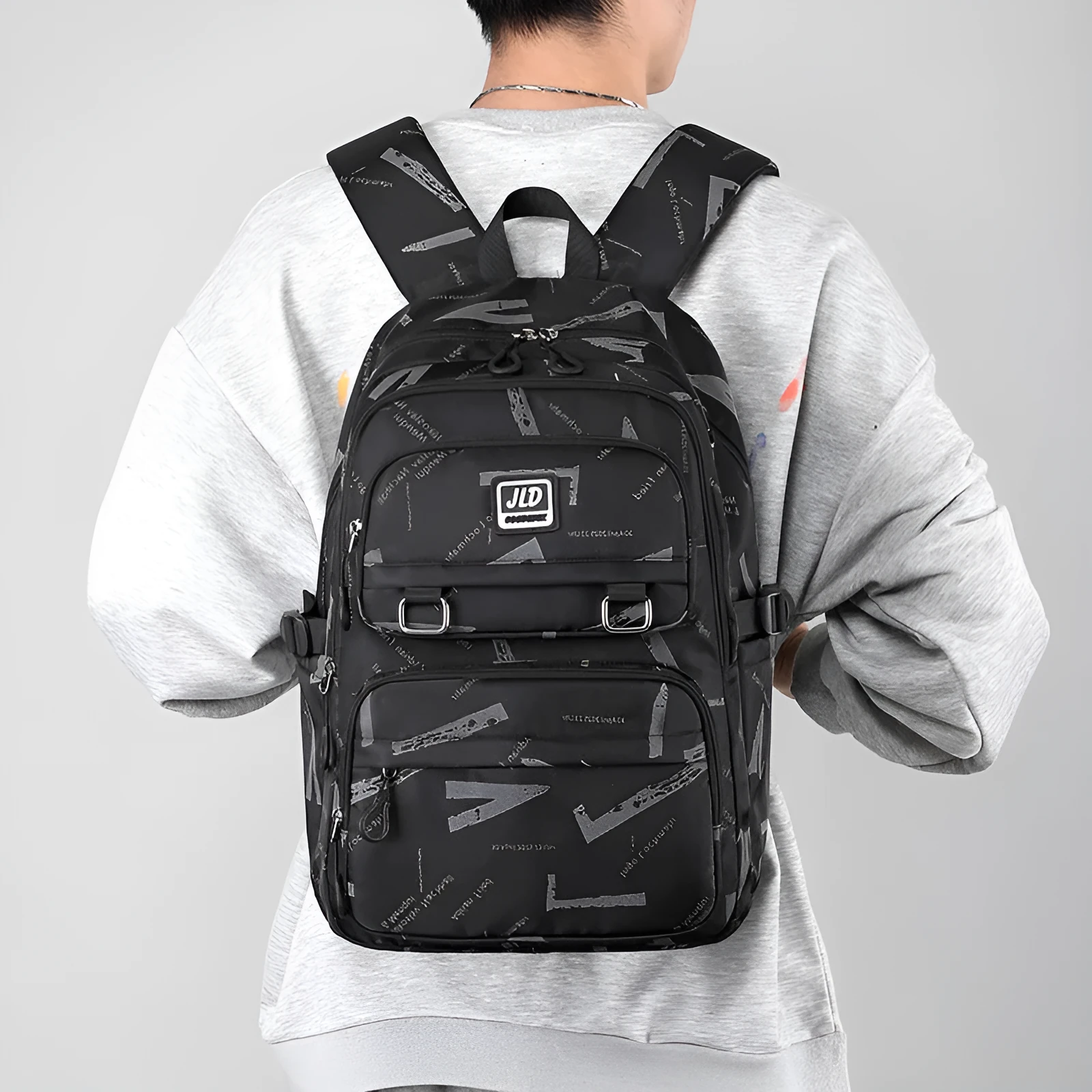 Girls' large capacity nylon school backpack in a selection of colours and graphic patterns on a physiological curve backplane.