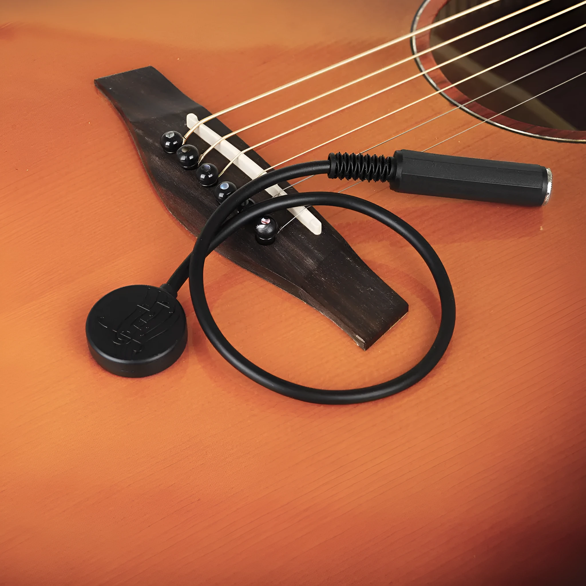 Black universal folk classical wooden guitar pickup clip with 40.7cm length on a guitar