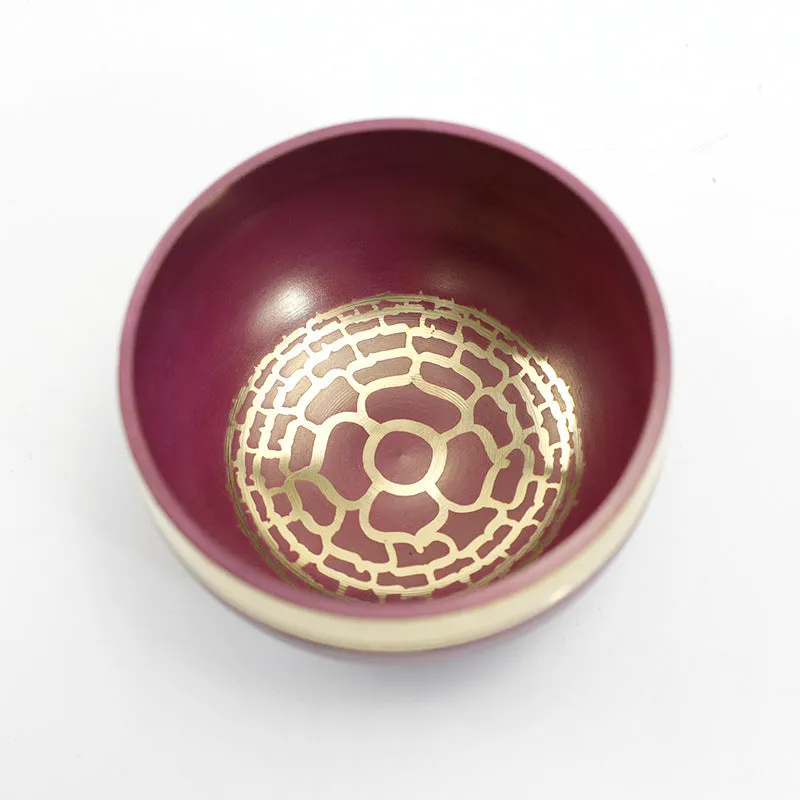 Handmade colourful Himalaya metal singing bowl and mallet, 7.8 cm in diameter.