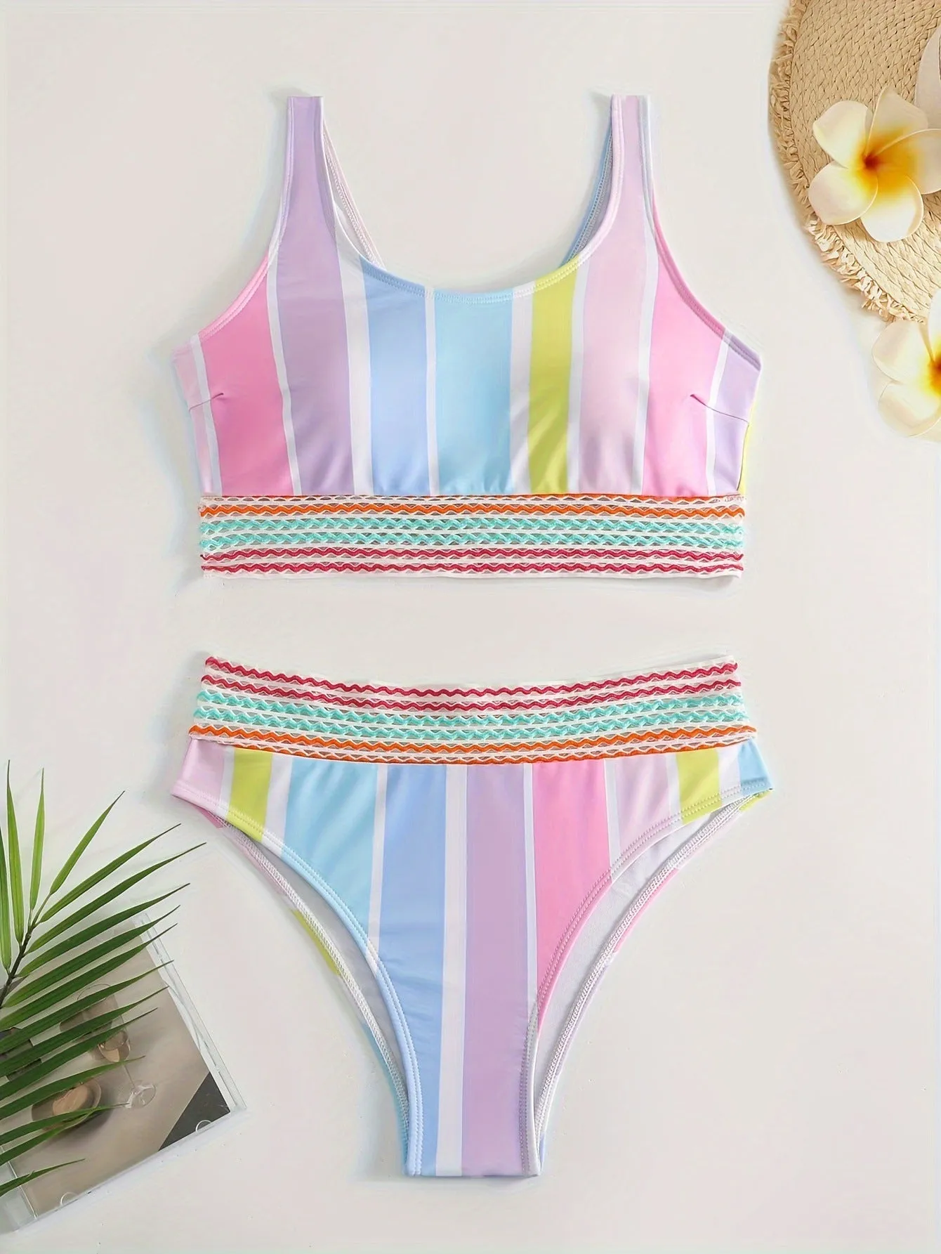 Women's striped two-piece bikini swimsuit in picture colour on a mannequin.