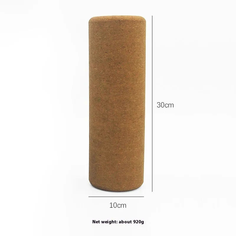 Cork yoga wand cylindrical massage roller 30x10cm on light background