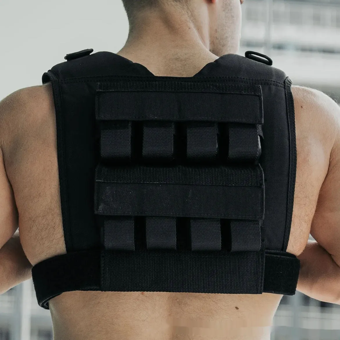 Black Oxford cloth adjustable weight vest for home gym and running with multiple weight options
