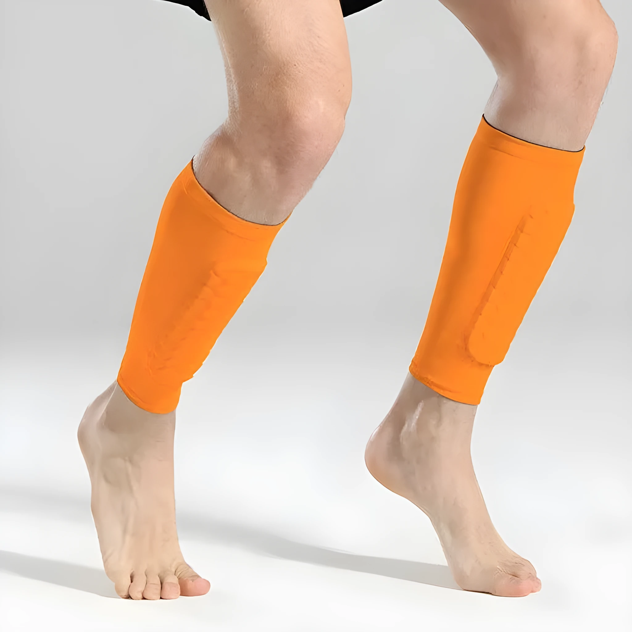 Men's thin Lycra joint protective knee sleeve in black, side view, for running and fitness