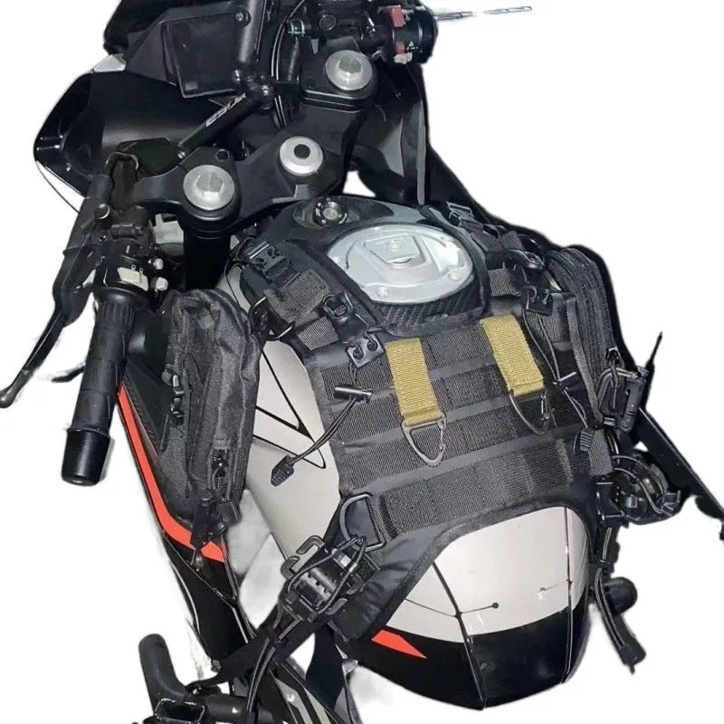 Universal black nylon motorcycle fuel tank bag mount base with adjustable straps on a black tank