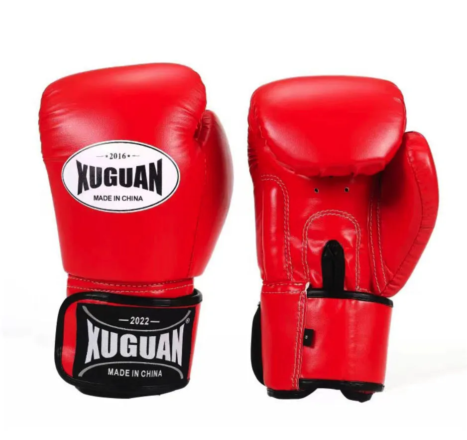 Pair of sandbag boxing gloves for Muay Thai training in red string colour, 10oz size
