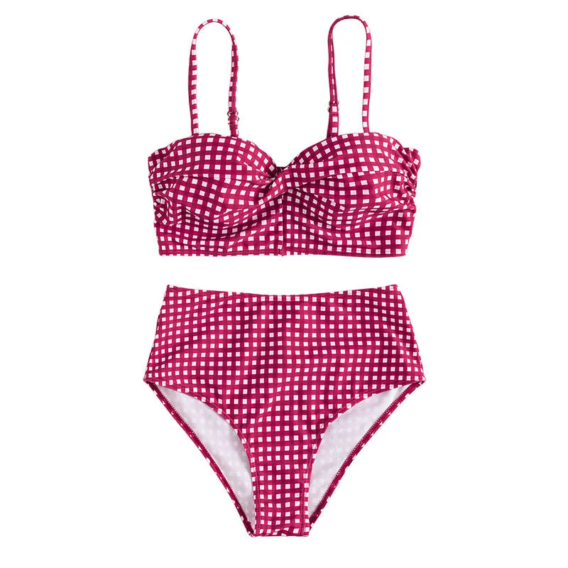 Women's rose red plaid high-waisted bikini set with a split design on the briefs, laid flat.