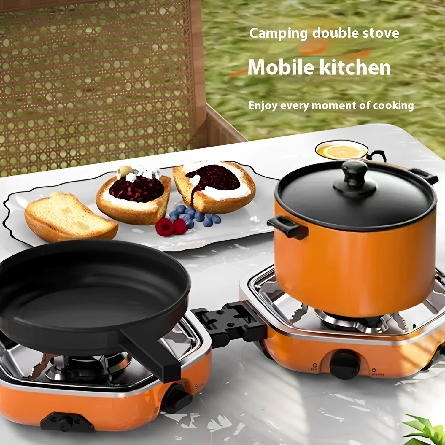 Orange portable double-headed butane camping gas stove folded and open on grass