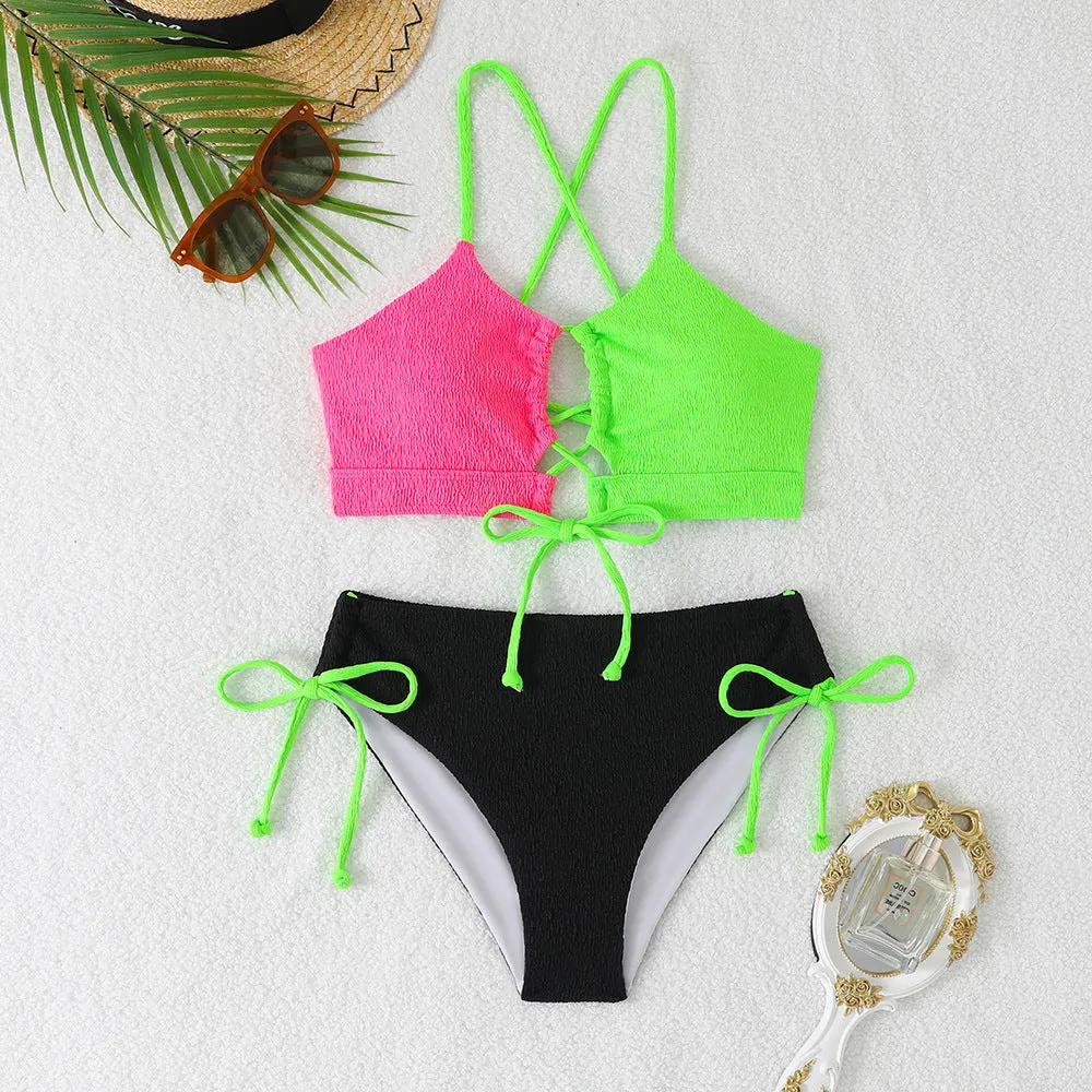 Women's black and white contrast colour cross sling hollow bikini set in polyester, front view