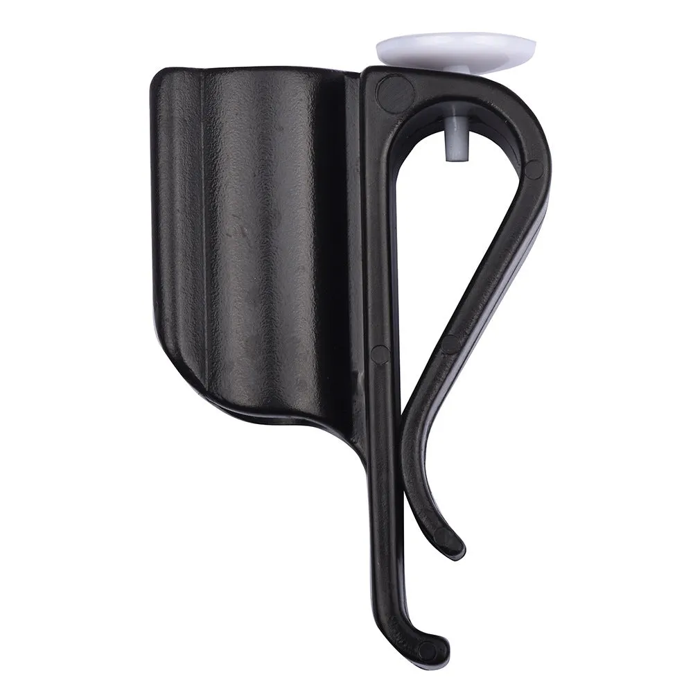 Black plastic putter fixing clip attached to golf bag, holding a putter securely