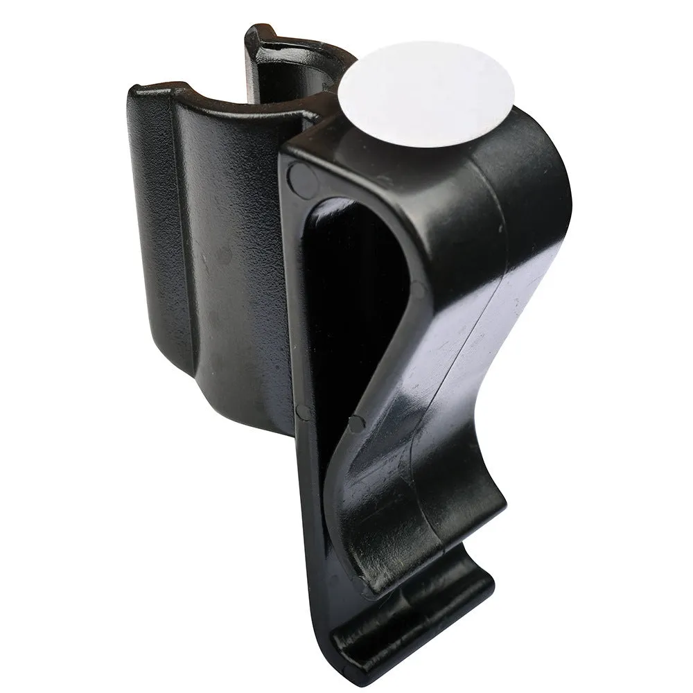 Black plastic putter fixing clip attached to golf bag, holding a putter securely