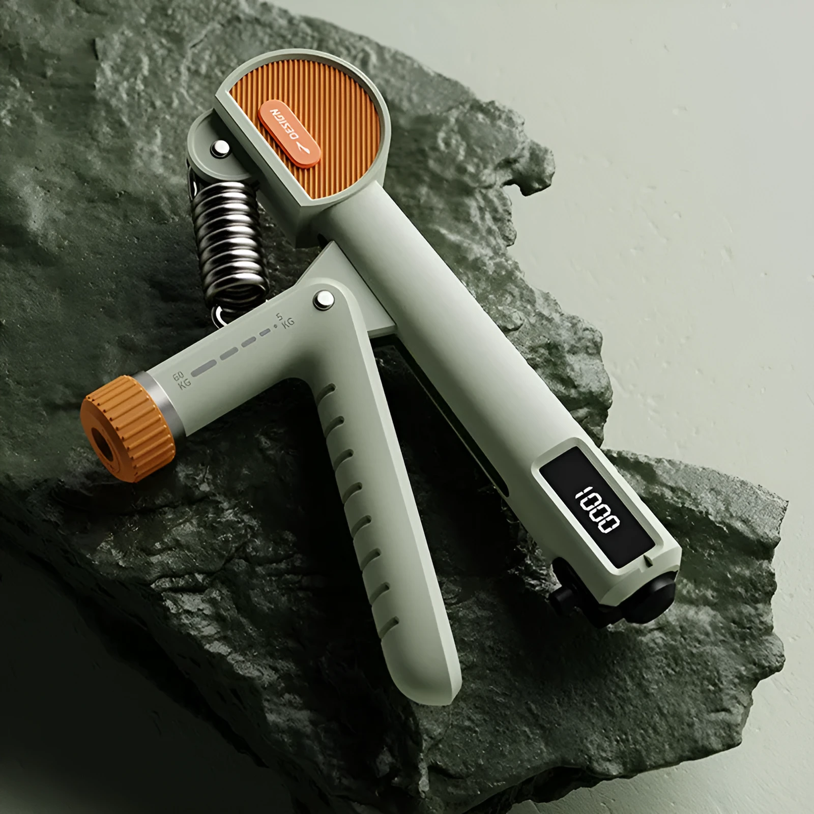Adjustable hand grip strengthener in ABS plastic, shown in ivory white, dark black, and army green colour options.