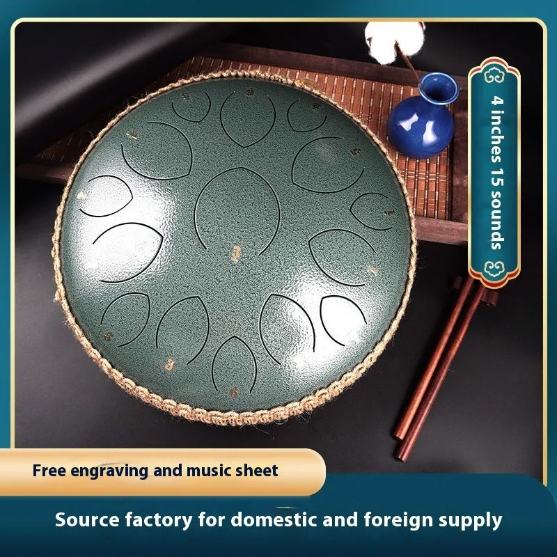 14-inch 15-tone hollow drum percussion instrument in malachite green finish on a wooden surface