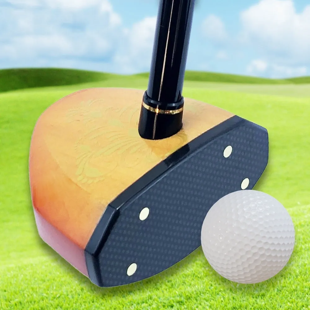 Maple head green golf training club with carbon rod body on a practice mat