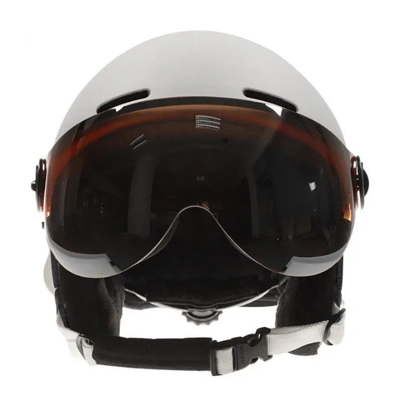 Moon ski helmet in black with polycarbonate shell and retractable visor on white background