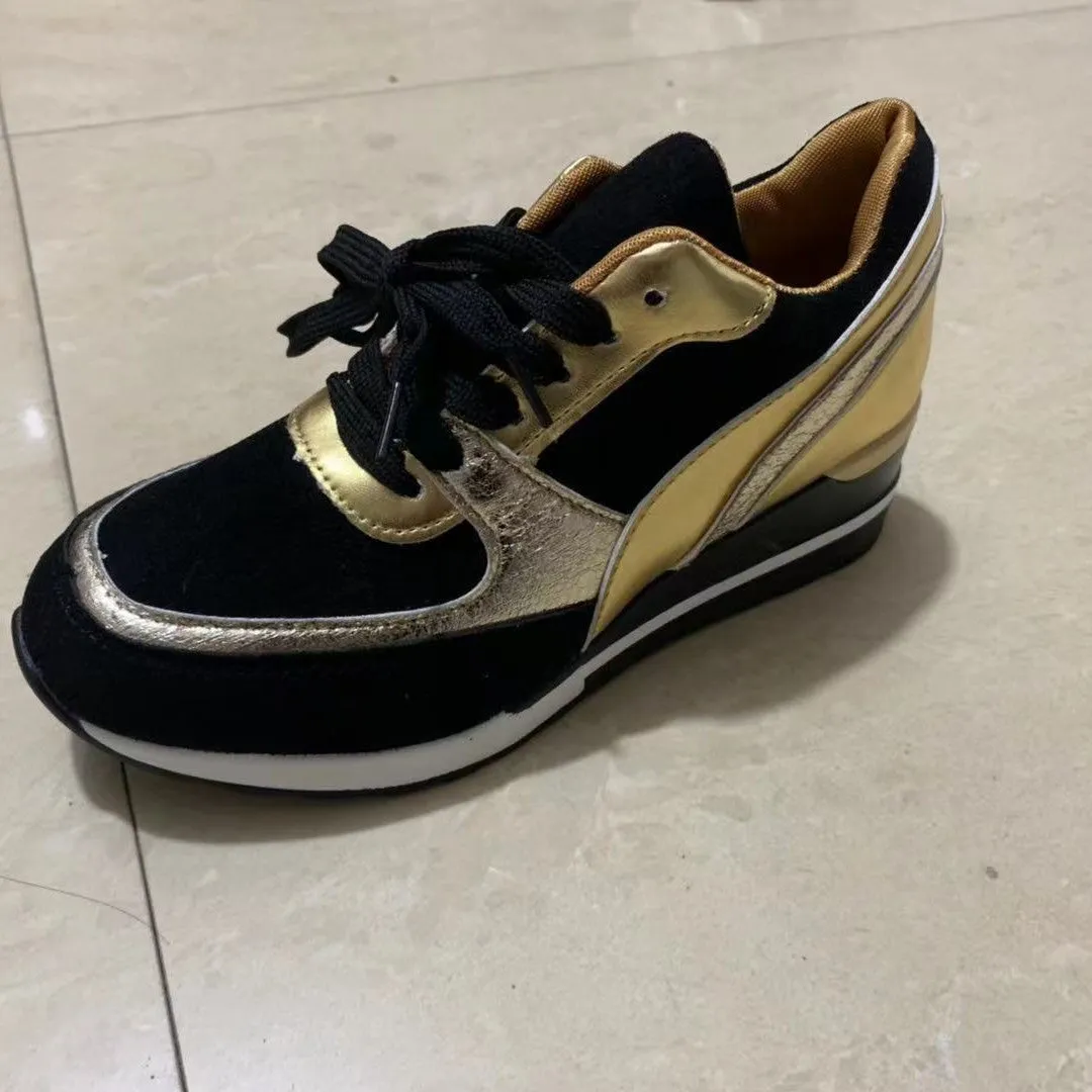 Women's black and gold platform colourblock sequin flat casual sneakers with lace-up closure on white background