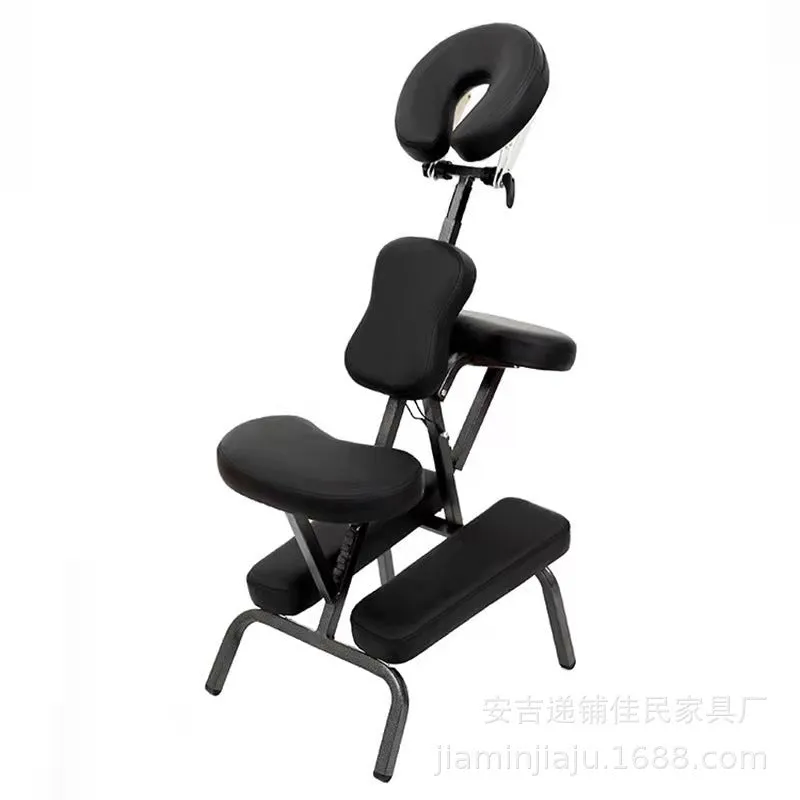Folding massage chair in black with PVC leather seat and wood steel frame for tattooing and massage use