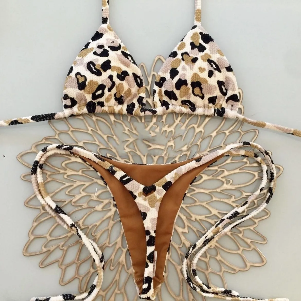 Women's printed bikini swimsuit in a briefs style, shown in one of the colour options RT1884, RT2110, or RT2111.