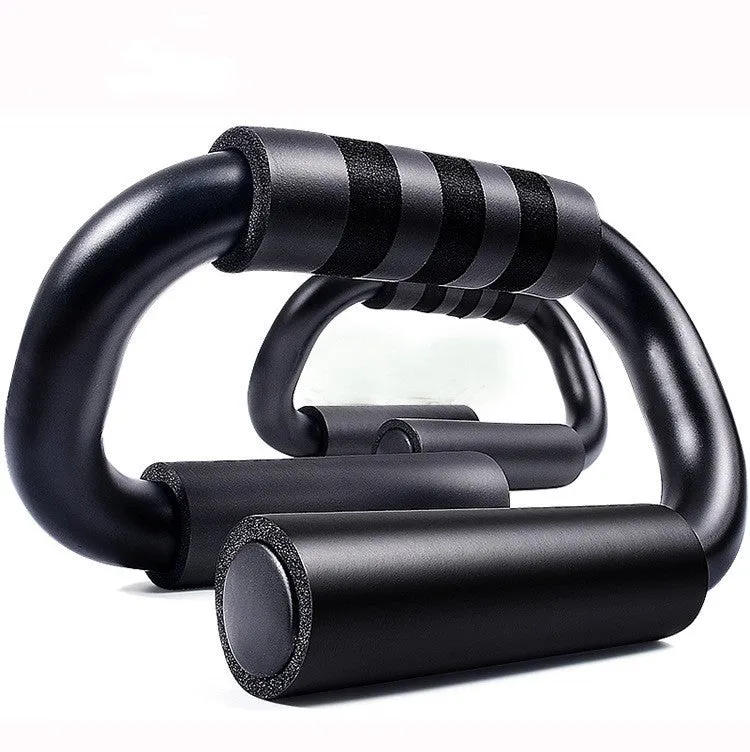 Black S shape push-up bracket rack on a home gym floor