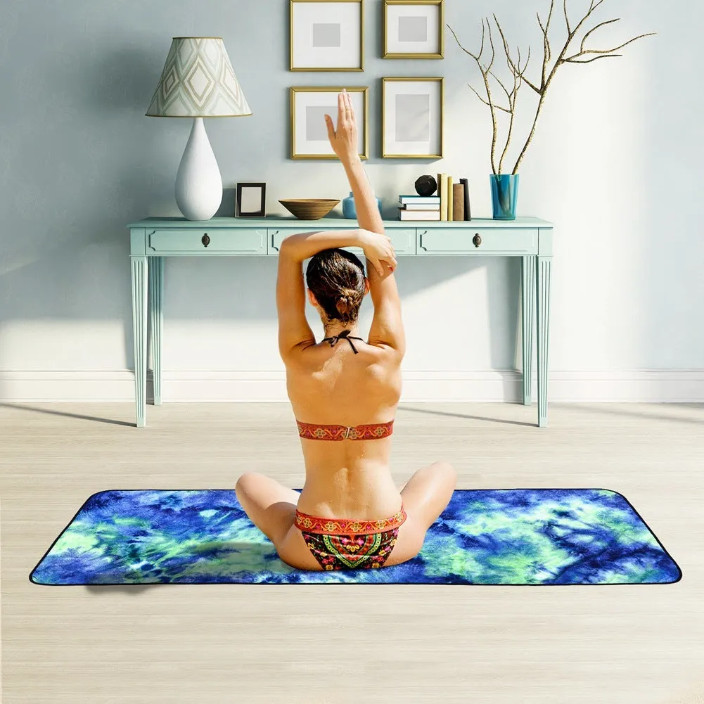 Tie-dyed blue microfiber non-slip yoga mat towel measuring 63x183cm on a yoga mat