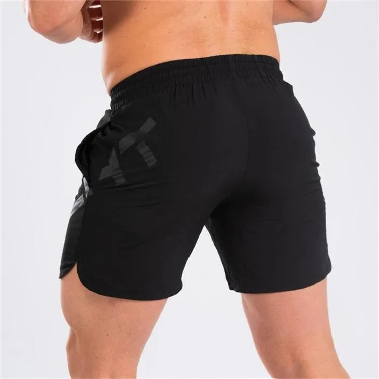 Men's black knee-length nylon training shorts with elastic waistband for summer sports