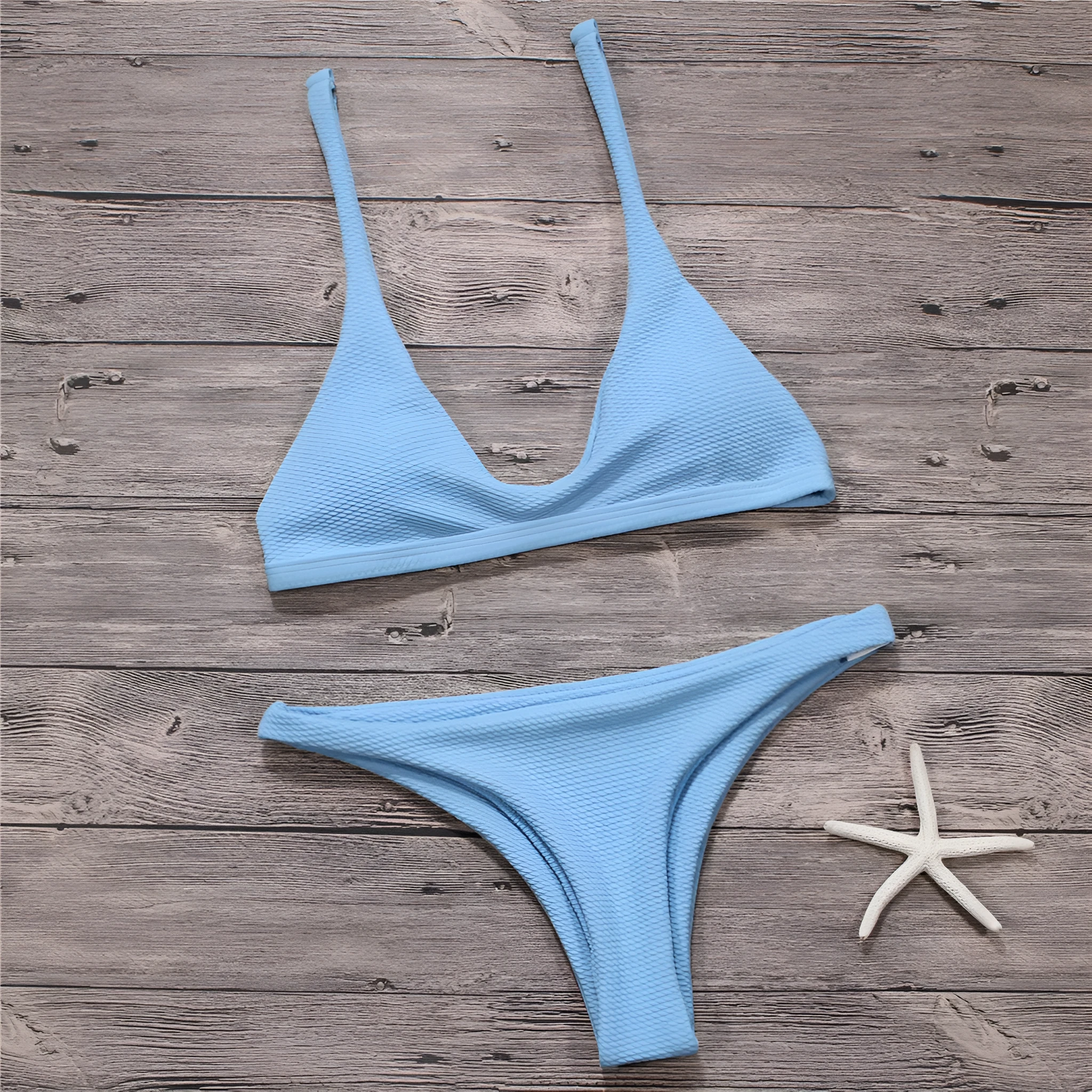Women's solid low waist bikini set in black with padded wire-free top and stretch fabric