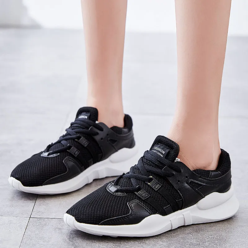 Breathable hollow out mesh casual sneakers in black and white colours with round toe design