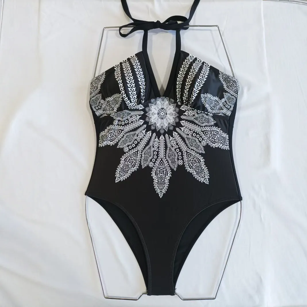Black women's triangle pattern corset one-piece swimsuit with backless design and tight fit