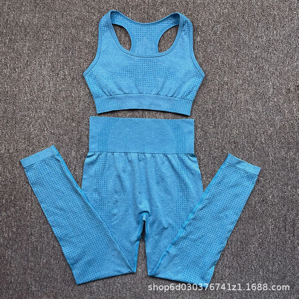 Three-piece yoga clothes set with bra, long sleeve top, and trousers in tight fit nylon blend fabric