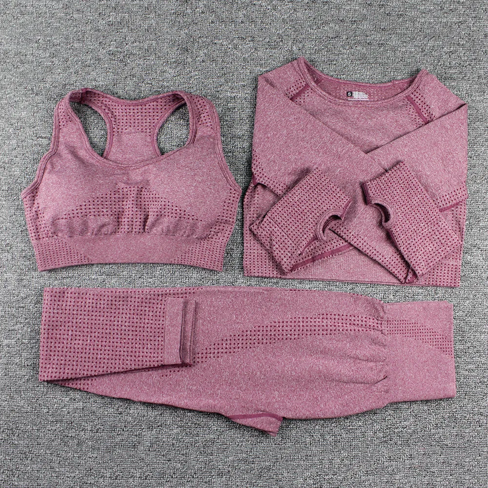 Three-piece yoga clothes set with bra, long sleeve top, and trousers in tight fit nylon blend fabric