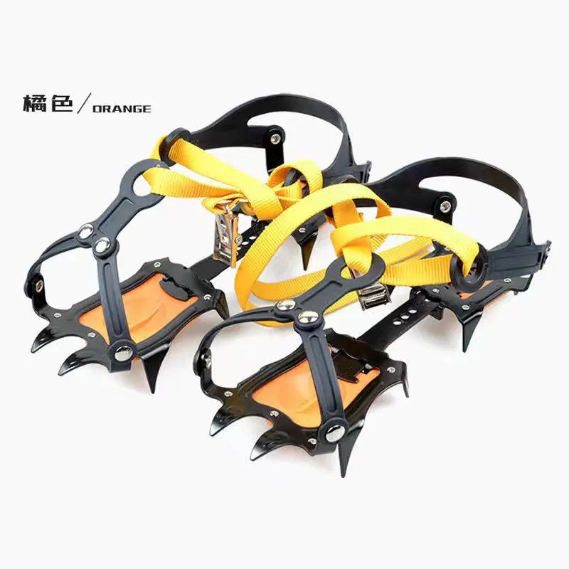 Pair of orange steel ten-teeth non-slip shoe cover crampons for snow ice traction