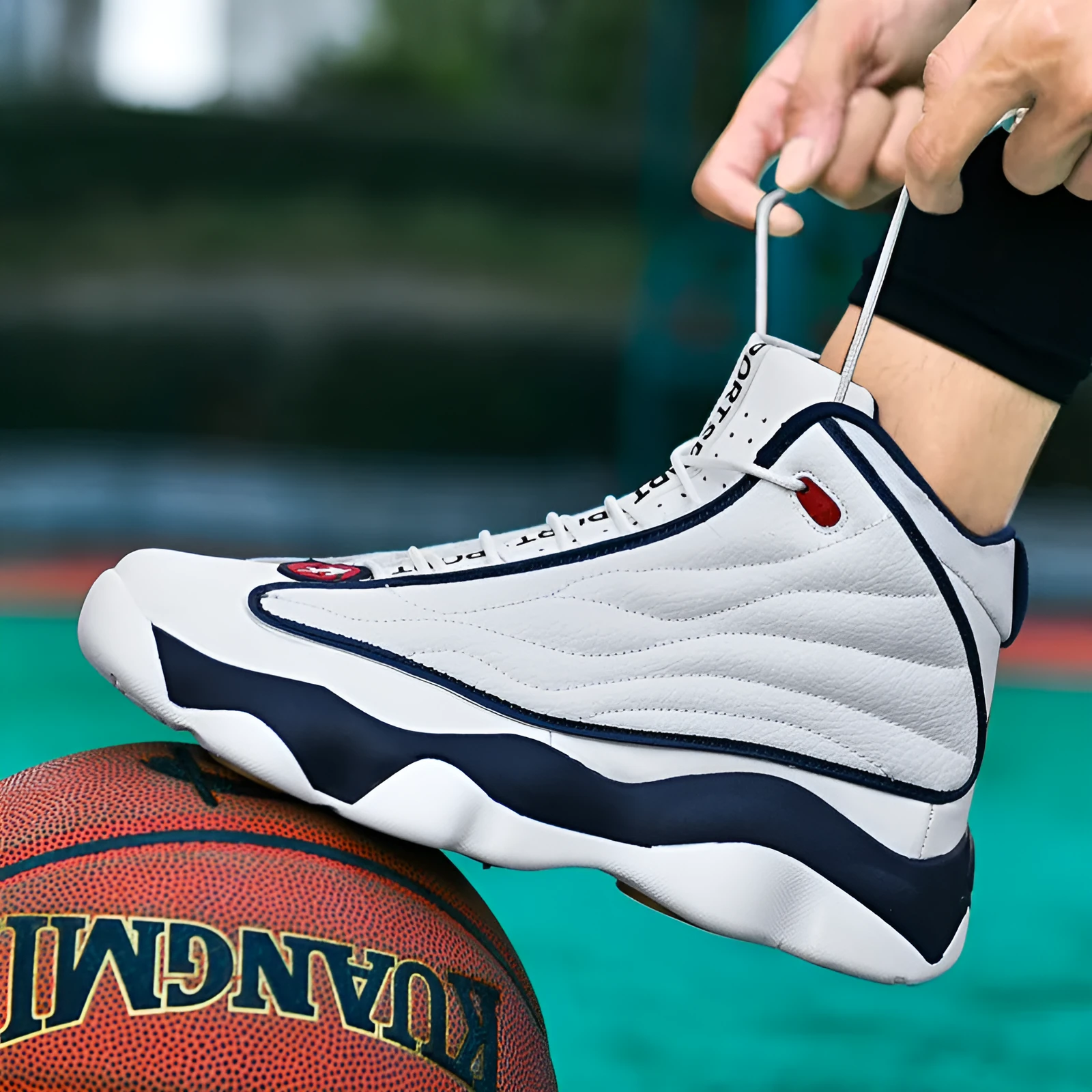 Men's high-top basketball shoes in AJ13 white red colourway with thick rubber sole and mesh upper.