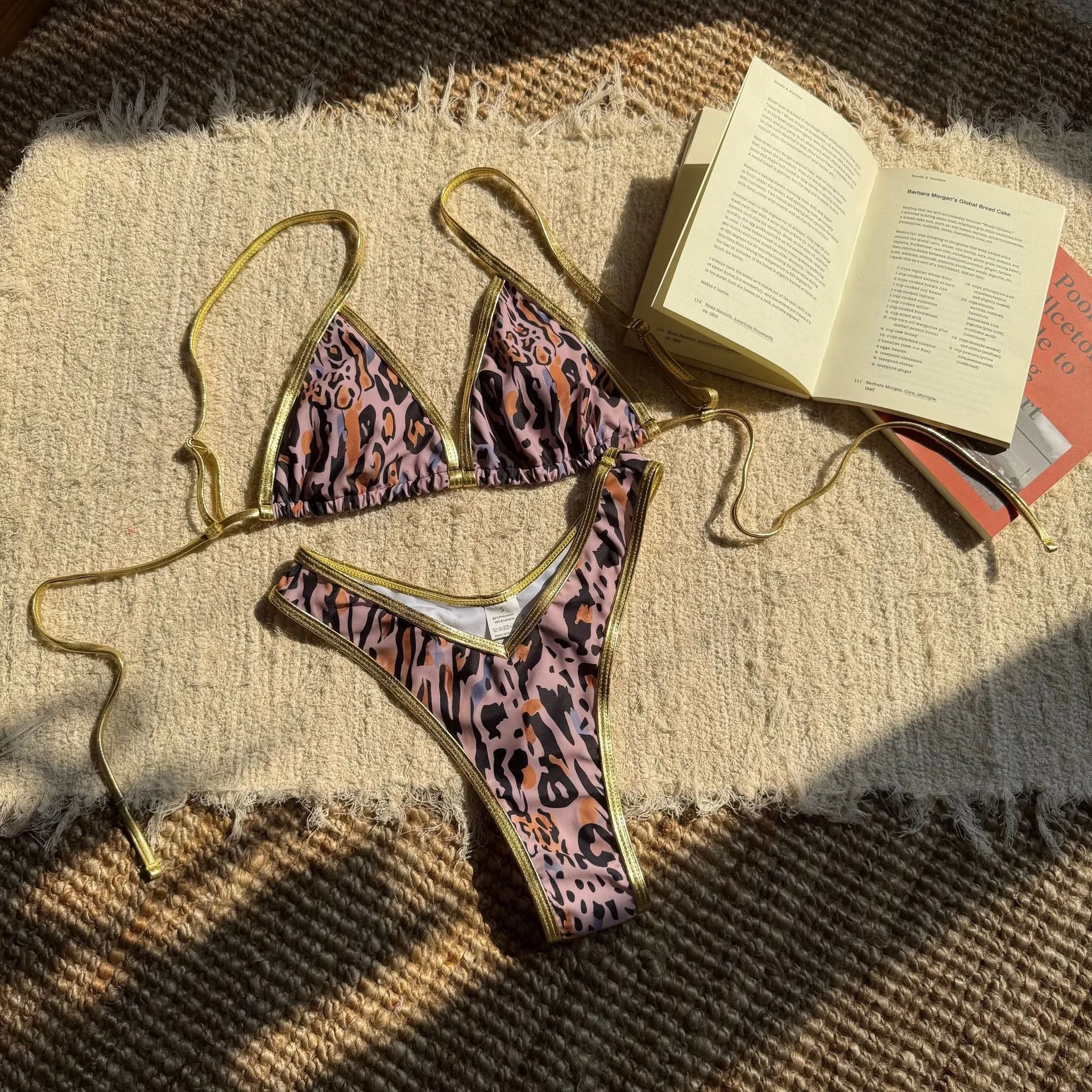 Women's split leopard print printed bikini set in polyester with brief bottom and sleeveless top