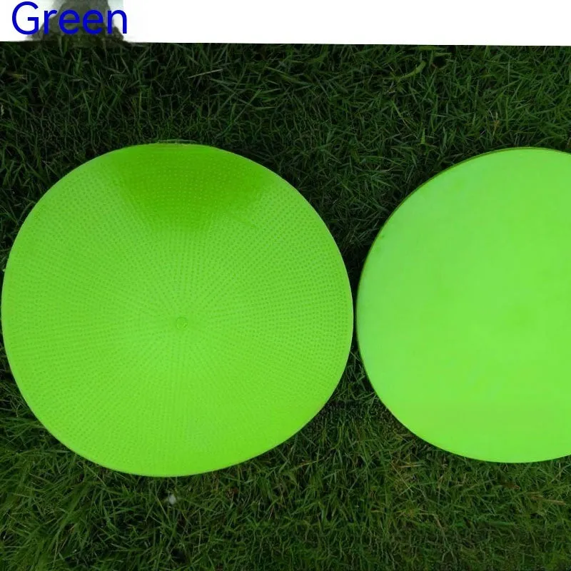 Soft circular football training target pad in bright colours measuring 23cm across
