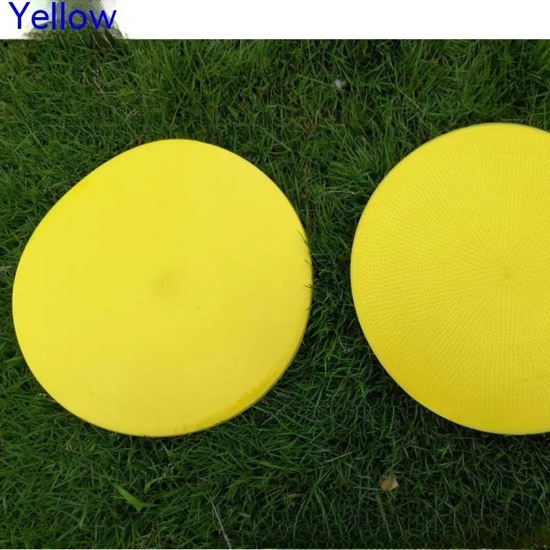 Soft circular football training target pad in bright colours measuring 23cm across