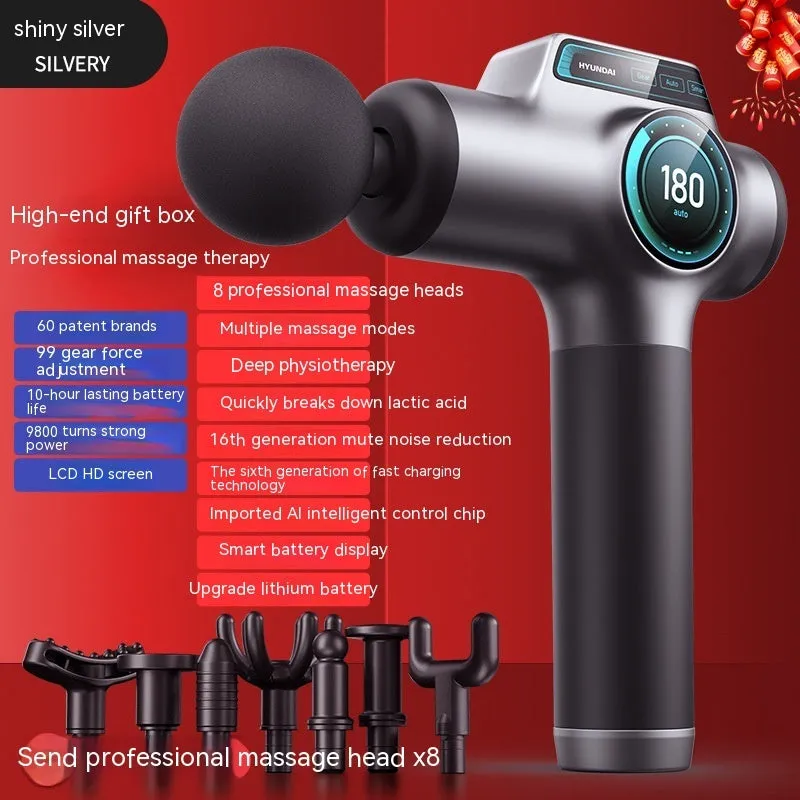 Grey mini massage gun with LED screen and four massage heads on a white background