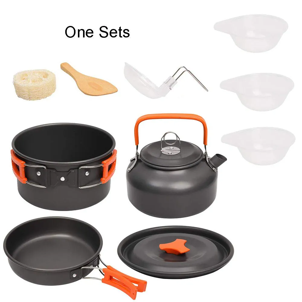 Orange camping cookware set with aluminium pots, pan, and utensils in a mesh bag