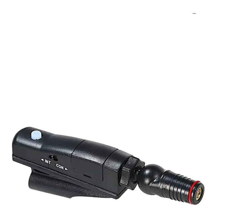Golf putter laser aiming instrument showing laser dot alignment on a practice green.