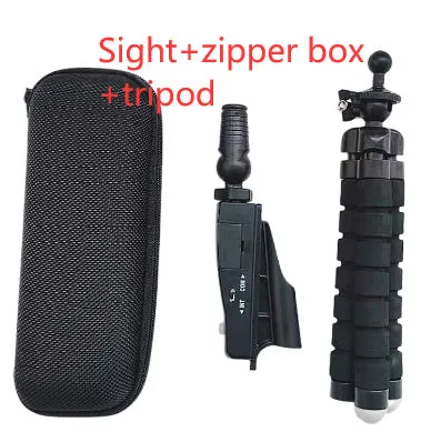 Golf putter laser aiming instrument showing laser dot alignment on a practice green.